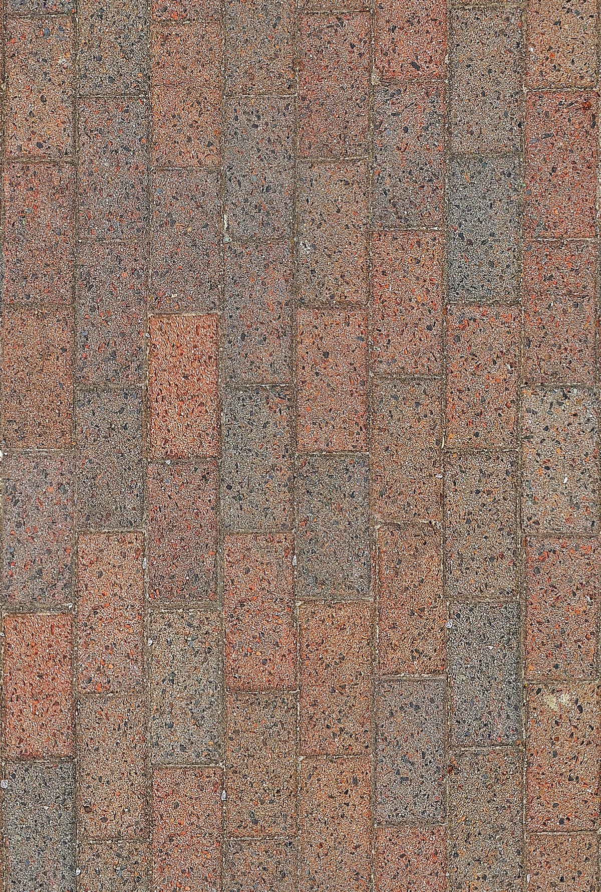 Detail van grijze en rode straatstenen — algemeen sfeerbeeld